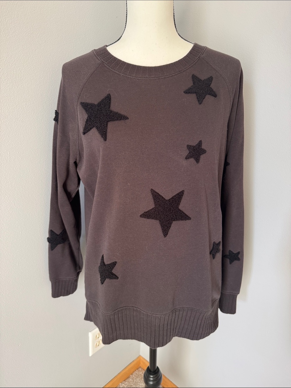 Maurices Black Crewneck Sweatshirt with Black Star Appliqués